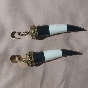 Tusk earrings for enlarged ears